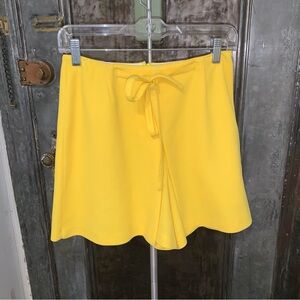 S Vintage 60s 70s mod yellow A-line mini skort Brand Ellen G tie at high waist